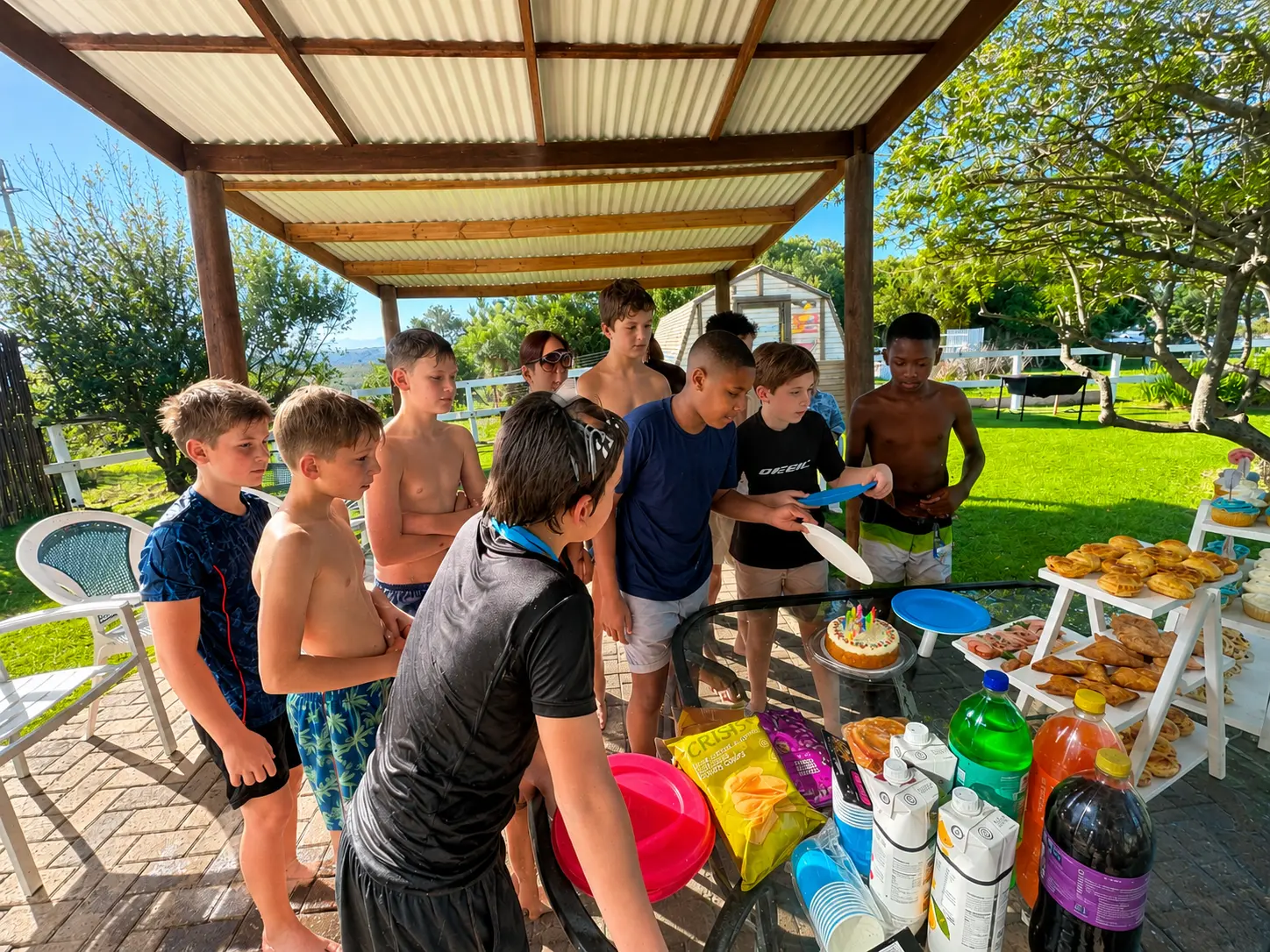Children around a snack table at a party hosted at the venue